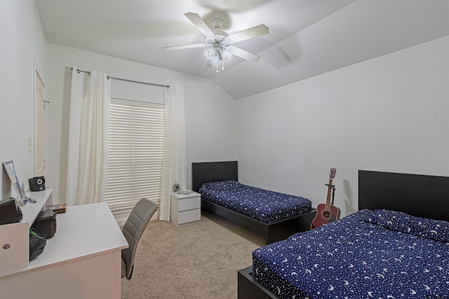 bedroom with light colored carpet, ceiling fan, and lofted ceiling