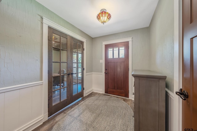 106 Forest S Dr, Whitehouse, TX 75791 - entryway featuring french doors, wood finished floors, and a wainscoted wall