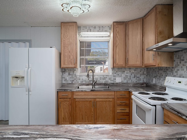 kitchen featuring white appliances, a textured ceiling, wall chimney exhaust hood, sink, and backsplash