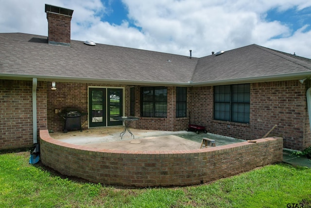 back of property featuring a patio