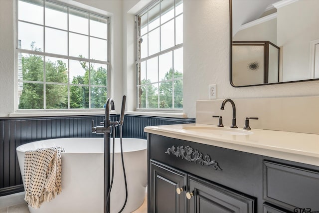 523 Southcreek Dr, Chandler, TX 75758 - bathroom with a shower stall, healthy amount of natural light, vanity, ornamental molding, and a soaking tub