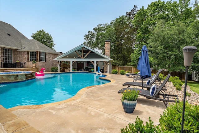 523 Southcreek Dr, Chandler, TX 75758 - view of pool with a gazebo, a patio area, fence, and a pool with connected hot tub