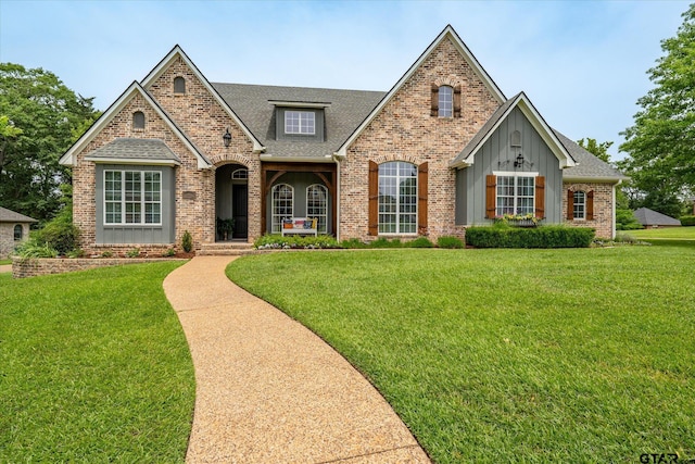 523 Southcreek Dr, Chandler, TX 75758 - view of front facade featuring brick siding, a front yard, and roof with shingles