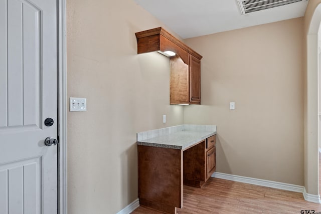 bathroom featuring wood-type flooring