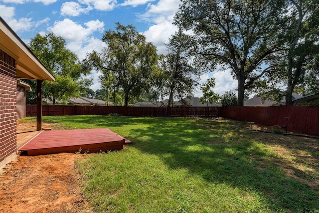 view of yard featuring a deck