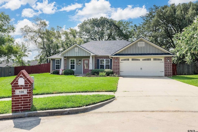 106 Bristol Cir, Chandler, TX 75758 - ranch-style home with board and batten siding, a garage, concrete driveway, and brick siding