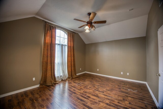 bonus room featuring dark hardwood / wood-style flooring, vaulted ceiling, and ceiling fan