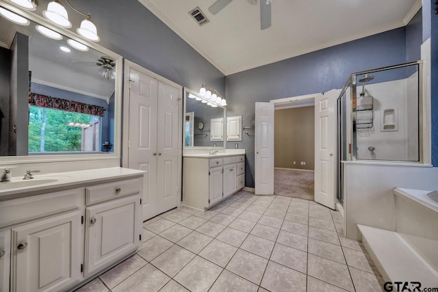 3606 Brookview Ct, Tyler, TX 75707 - bathroom with a ceiling fan, crown molding, tile patterned floors, two vanities, and a stall shower