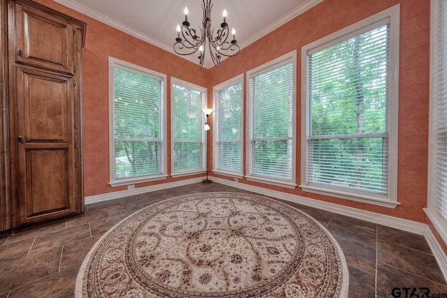 3606 Brookview Ct, Tyler, TX 75707 - dining space with a chandelier, stone tile floors, plenty of natural light, and ornamental molding