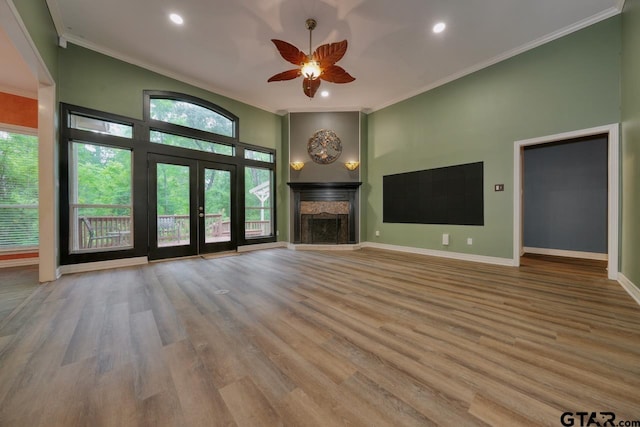 3606 Brookview Ct, Tyler, TX 75707 - unfurnished living room featuring healthy amount of natural light, ceiling fan, crown molding, wood finished floors, and recessed lighting