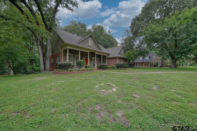 3606 Brookview Ct, Tyler, TX 75707 - view of front of house featuring a front lawn and brick siding