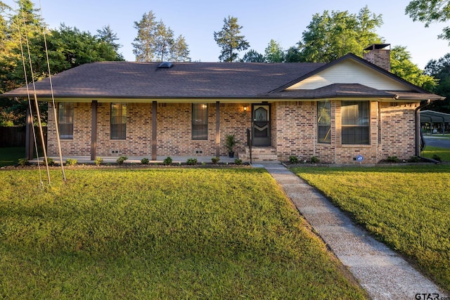 single story home with a front lawn and a porch