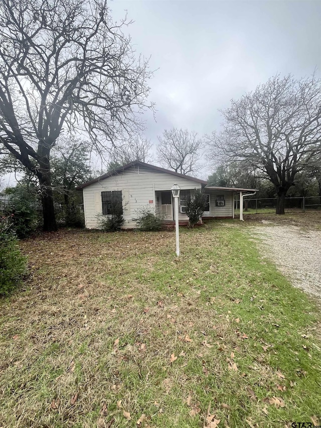 exterior space featuring a front yard