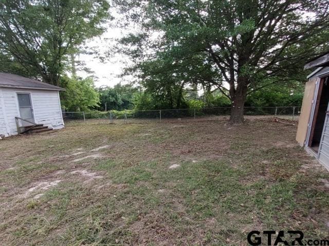 2401 E Fm 852, Winnsboro, TX 75494 - view of yard featuring a fenced backyard