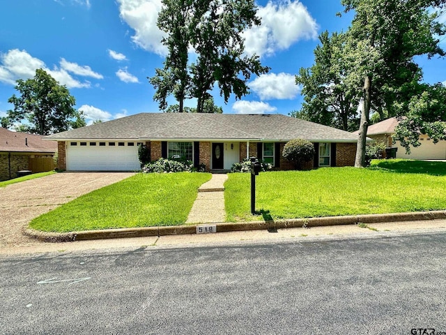 518 Meadow Creek Dr, Tyler, TX 75703 - ranch-style home with a front yard, concrete driveway, an attached garage, and brick siding