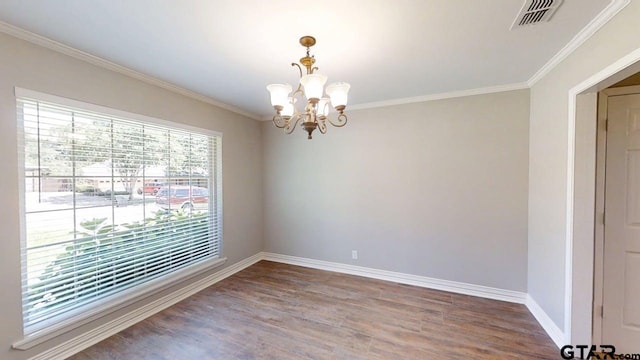 518 Meadow Creek Dr, Tyler, TX 75703 - empty room featuring wood finished floors, a chandelier, and crown molding