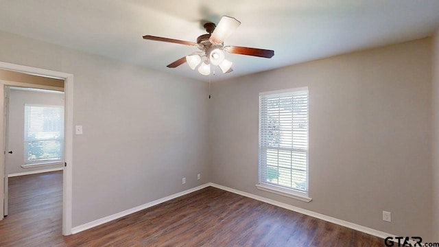 518 Meadow Creek Dr, Tyler, TX 75703 - empty room with a ceiling fan and dark wood finished floors