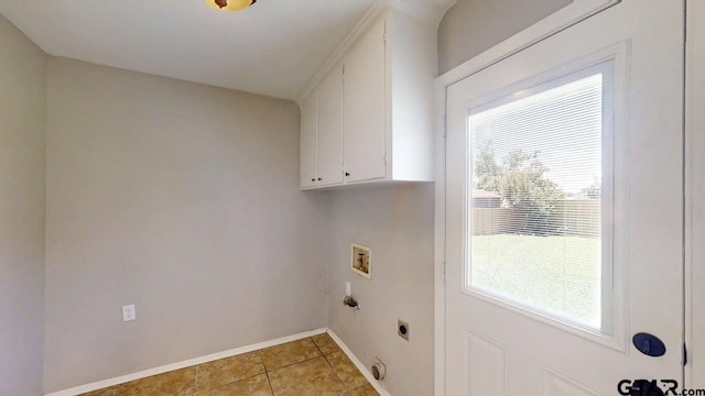 518 Meadow Creek Dr, Tyler, TX 75703 - laundry area featuring cabinet space, electric dryer hookup, and hookup for a washing machine