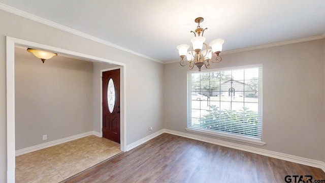 518 Meadow Creek Dr, Tyler, TX 75703 - entryway with a chandelier, wood finished floors, and crown molding