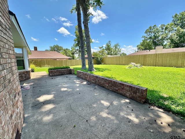 518 Meadow Creek Dr, Tyler, TX 75703 - fenced backyard featuring a patio