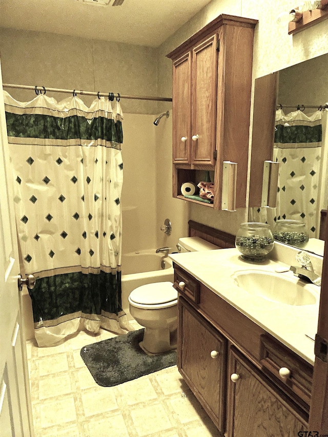 full bathroom with shower / bathtub combination with curtain, vanity, and toilet