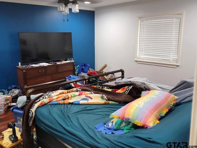 bedroom featuring crown molding