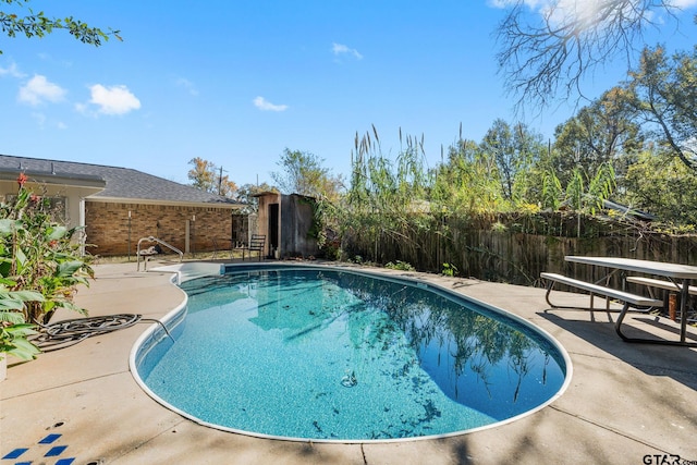 view of pool with a patio