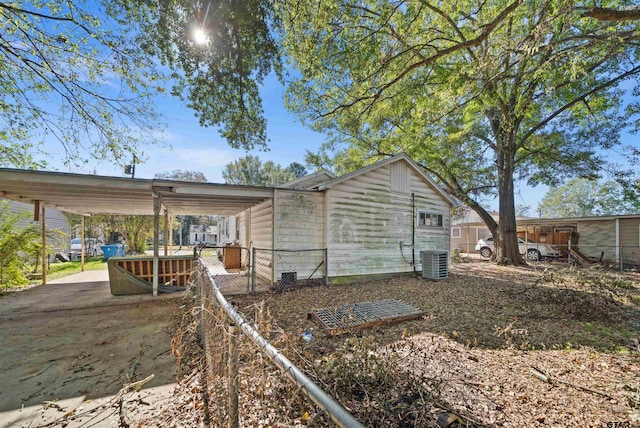 back of property with cooling unit