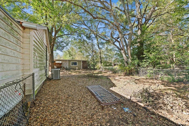 view of yard featuring central AC unit