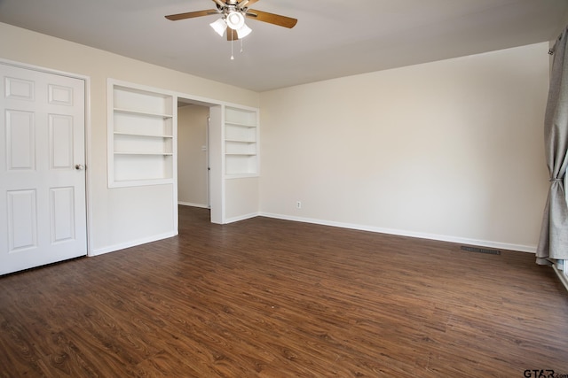 unfurnished bedroom featuring ceiling fan and dark wood-type flooring