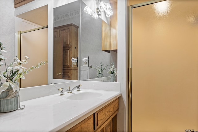 bathroom featuring vanity and walk in shower