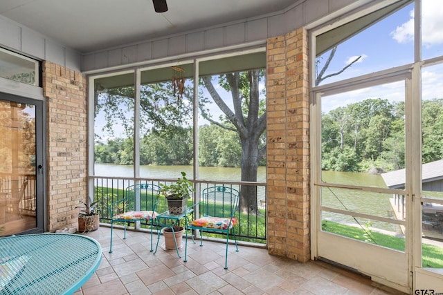 sunroom with a water view