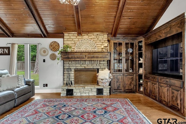 425 Lakeview Dr, Hideaway, TX 75771 - living area featuring wood ceiling, light wood-style flooring, a fireplace, and baseboards