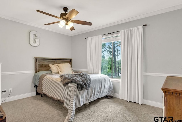 425 Lakeview Dr, Hideaway, TX 75771 - bedroom with ornamental molding, baseboards, ceiling fan, and carpet flooring