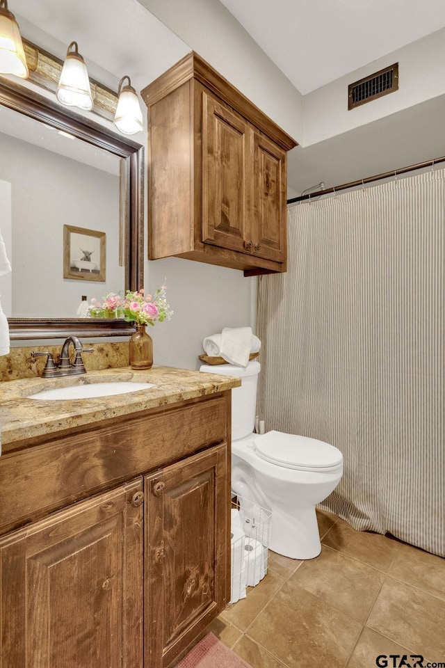 425 Lakeview Dr, Hideaway, TX 75771 - full bathroom with toilet, vanity, tile patterned floors, and curtained shower
