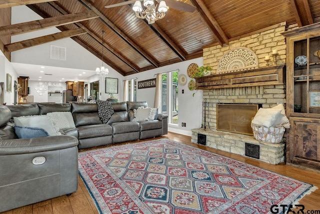425 Lakeview Dr, Hideaway, TX 75771 - living area featuring ceiling fan, high vaulted ceiling, wood ceiling, wood finished floors, and beamed ceiling