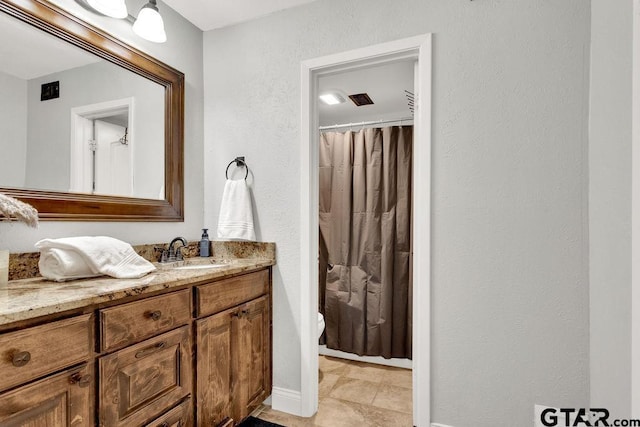 425 Lakeview Dr, Hideaway, TX 75771 - bathroom featuring vanity, baseboards, and curtained shower
