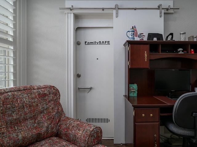 office area featuring a barn door