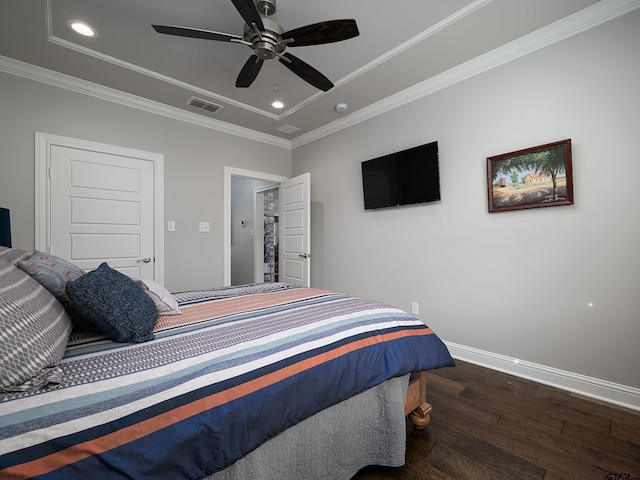 bedroom with baseboards, visible vents, dark wood-style flooring, crown molding, and recessed lighting