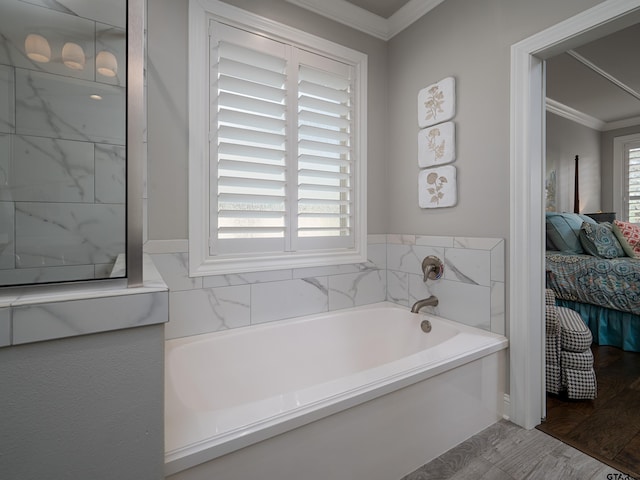 ensuite bathroom featuring a bath, crown molding, connected bathroom, and wood finished floors