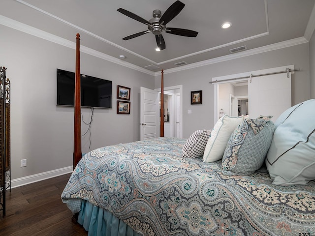 bedroom with baseboards, visible vents, wood finished floors, and ornamental molding