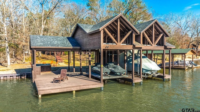 dock area featuring a water view and boat lift