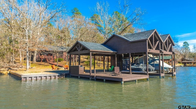 view of dock featuring a water view and boat lift