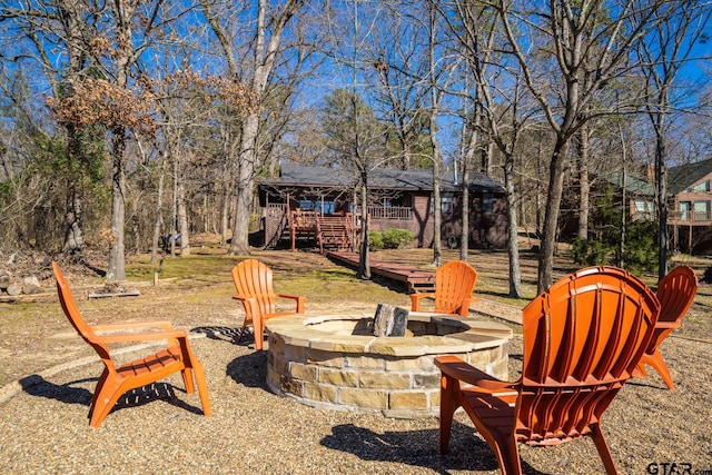 view of yard featuring a fire pit