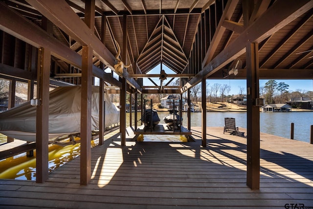 view of dock with a water view and boat lift