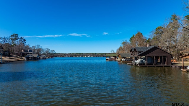 property view of water with a boat dock and boat lift