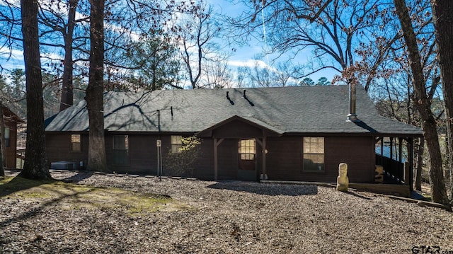 view of front of property with a shingled roof