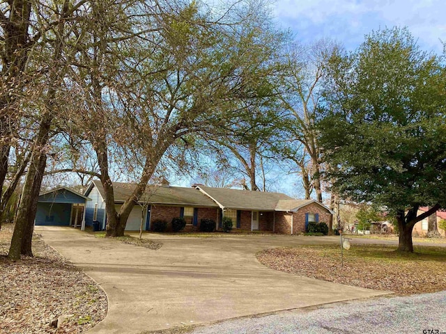 single story home featuring a garage