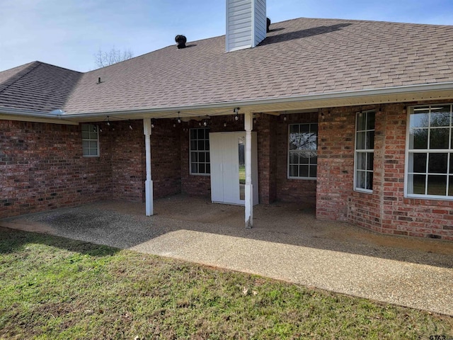 rear view of property with a patio area