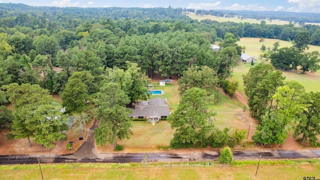 birds eye view of property with a rural view